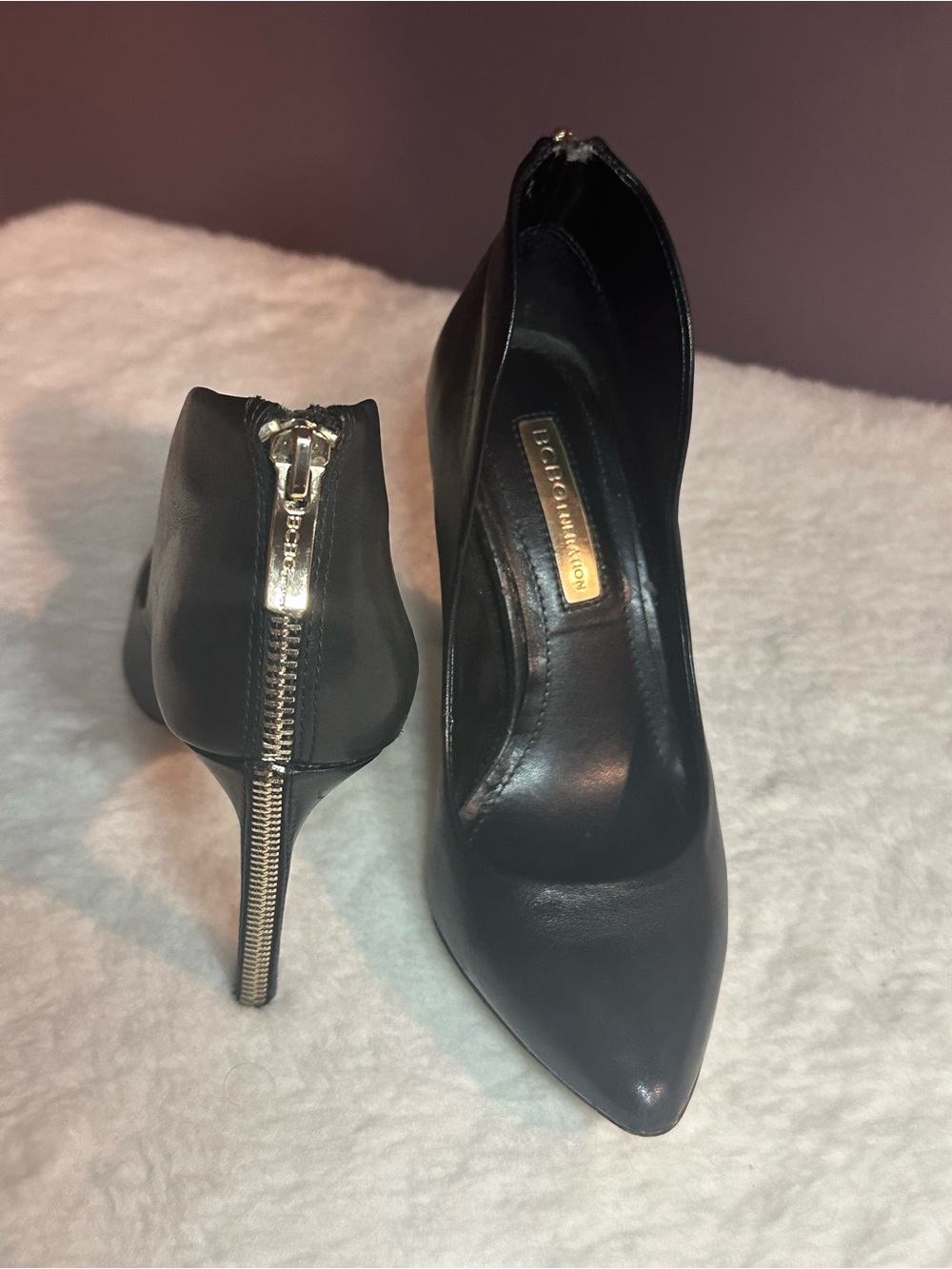 BCBGeneration Black Leather Pointed Toe Stiletto Heels with Gold Zipper